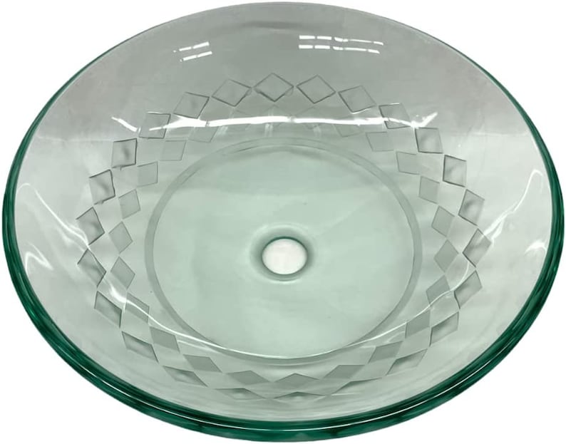 May include: A clear glass vessel sink with a diamond pattern etched into the surface. The sink has a round shape and a smooth, polished edge.