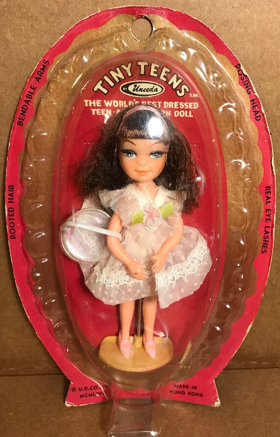 tiny teen doll