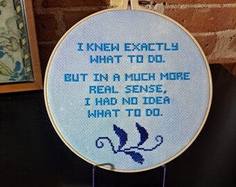 Cita de Michael Scott en punto de cruz