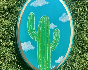 Nothing but blue skies 5x7 wooden oval. Wood burned hand painted art. Acrylic on wood. Cactus, desert art. Sonoran desert cactus painting.