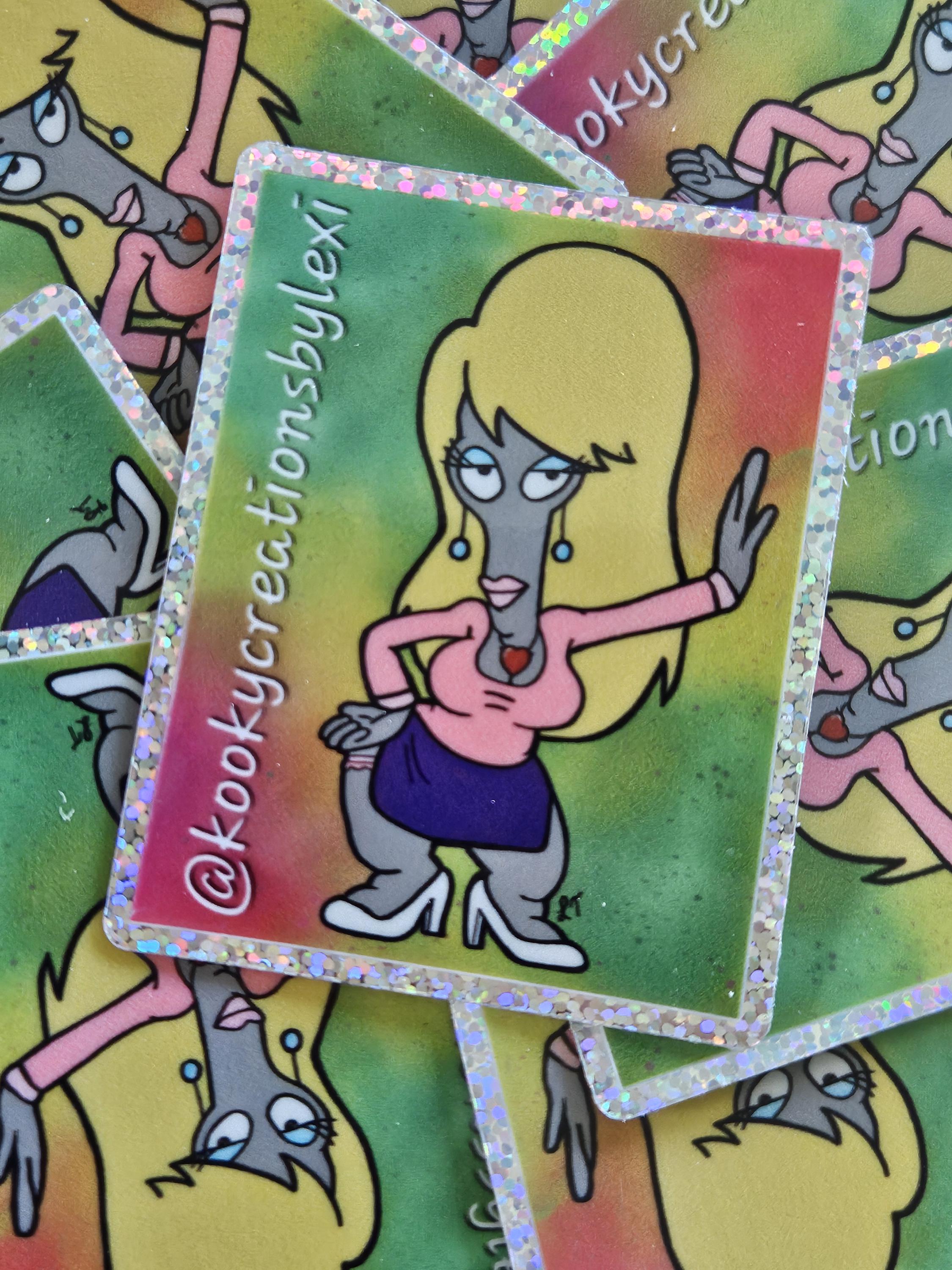 Roger as Laura Van Der Booben Glitter Sticker. 3x2inch American
