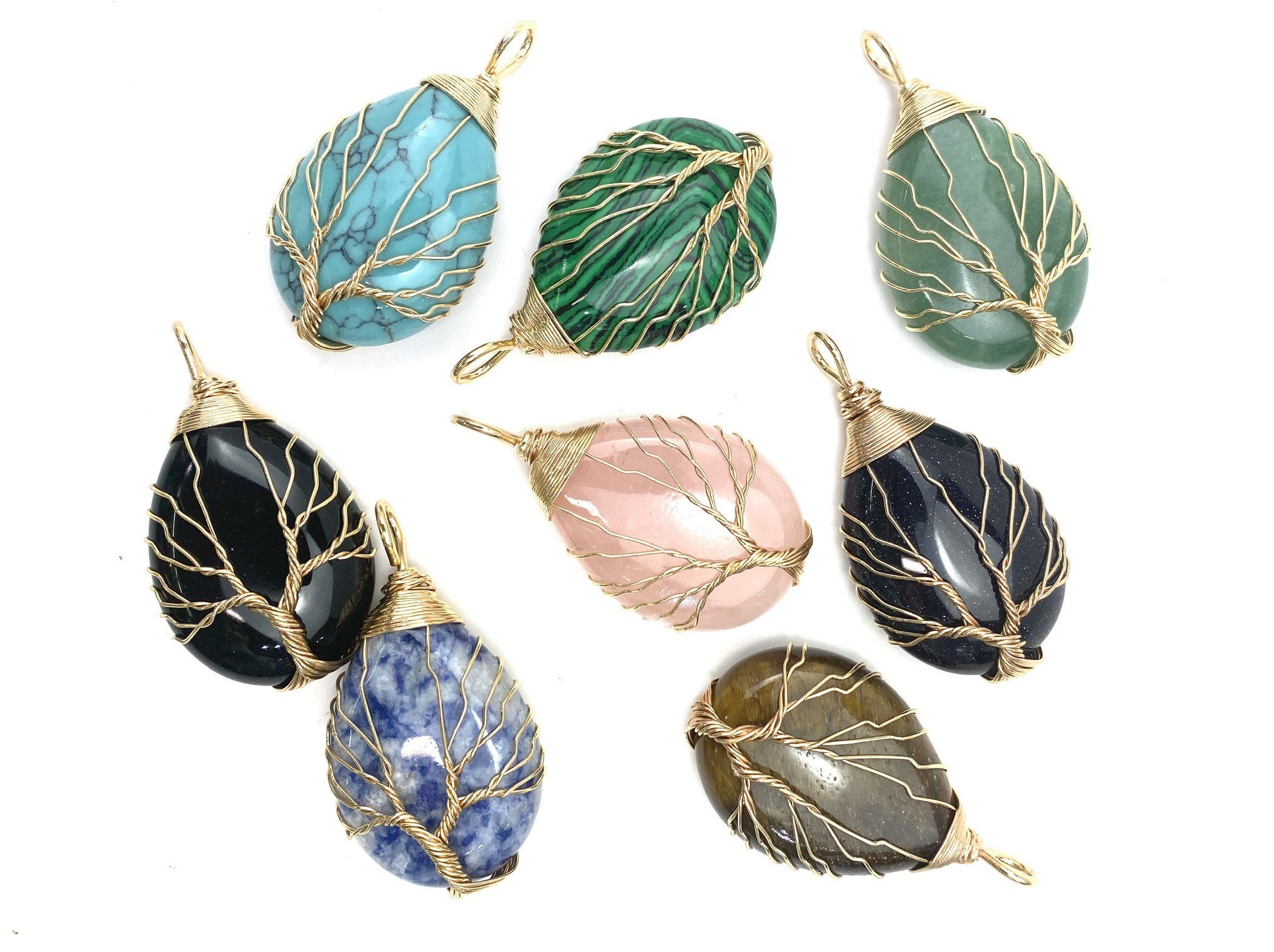 Wire wrapped tree of cheap life over stone