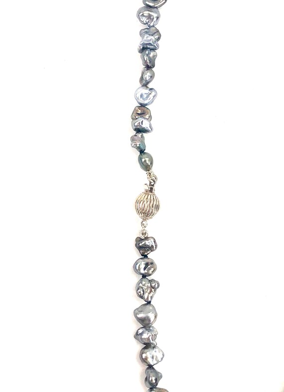 Tahitian Keshi strand with sterling silver ball clasp , SKU# 070712