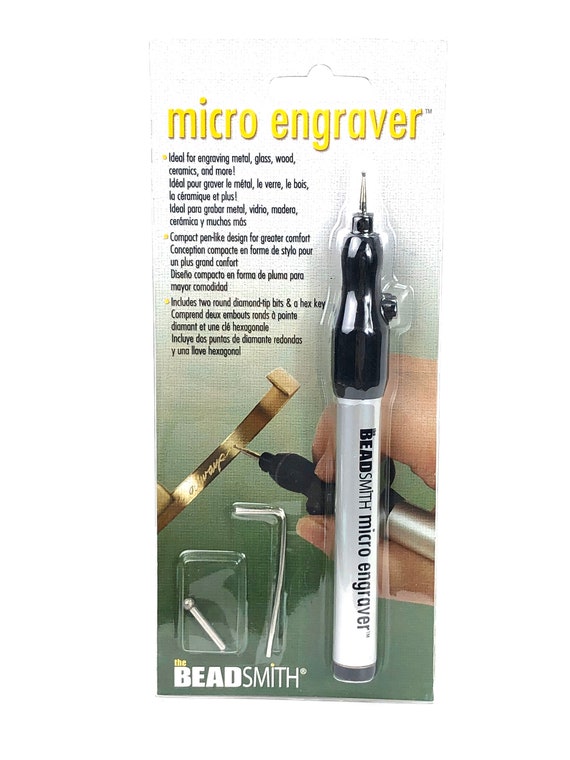 Micro engraver , includes two round -tip bits & a hex key . SKU# MCRI