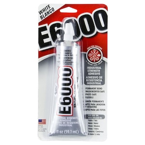 May include: A white tube of E6000 industrial strength adhesive with a red and white label. The label says "E6000" in large black letters and "Industrial Strength Adhesive" in smaller black letters. The label also says "Best for Creating" and "Le Mejor Para Crear". The tube is 2.1 ounces (59.1 ml).