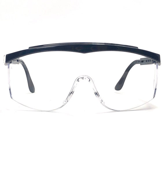 Clear safety glasses with black temples and top bar , SKU #SS11OAF