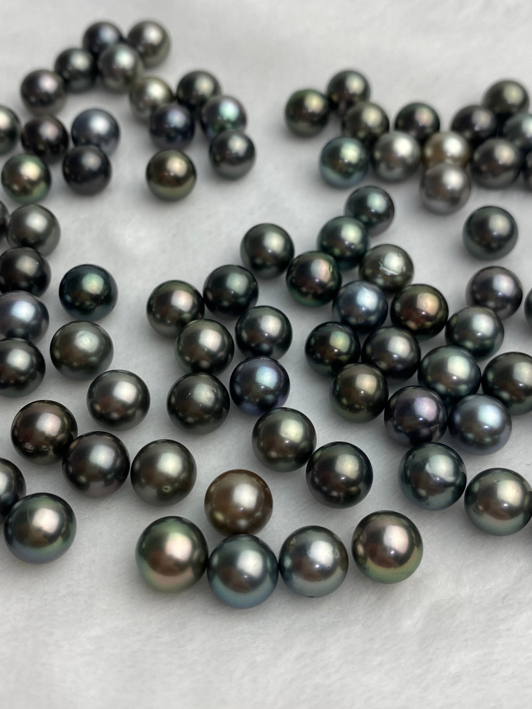 AAA Tahitian Pearls, 7mm round semi round, dark multi colors (Item #954)