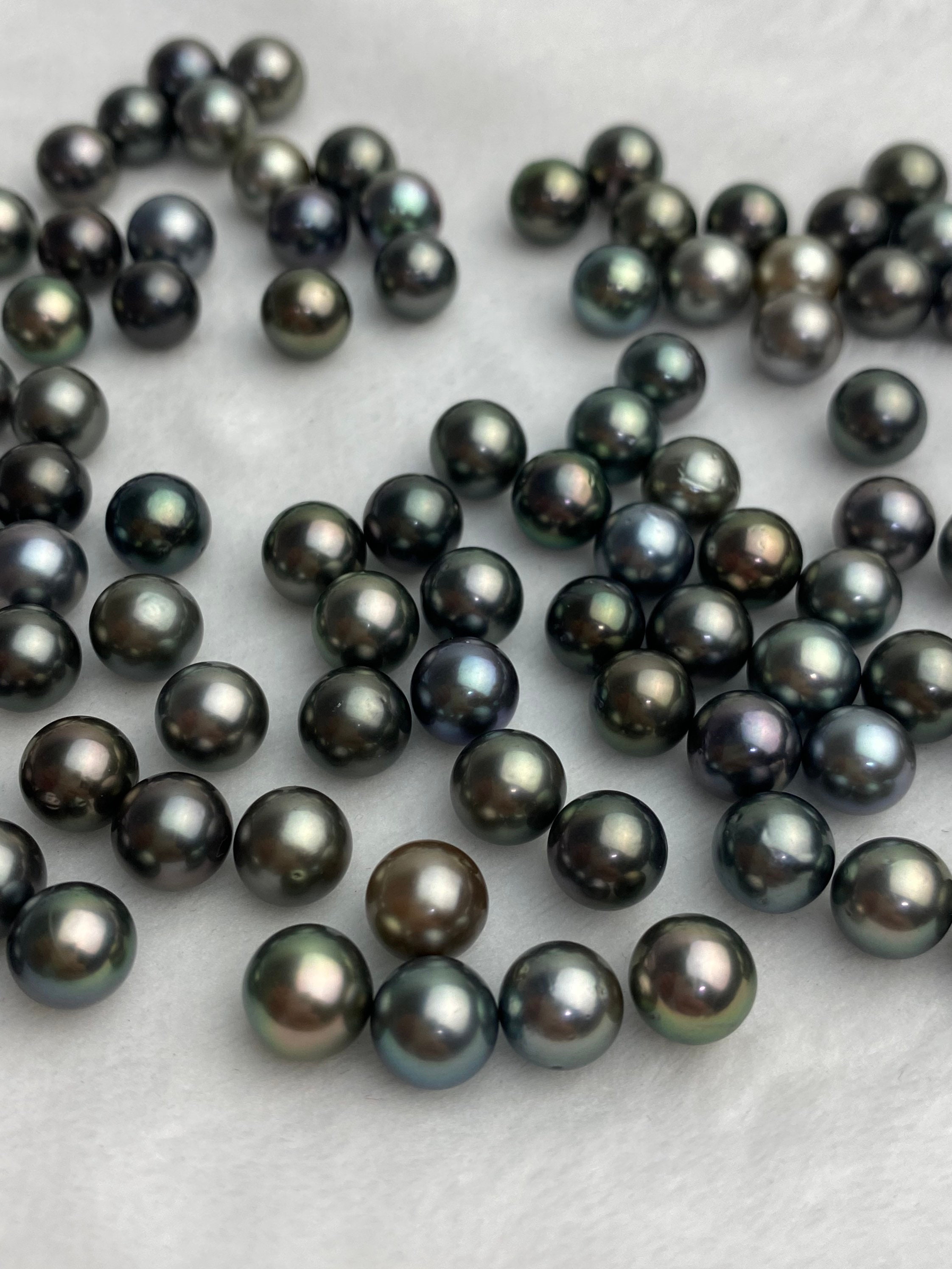 AAA Tahitian Pearls, 7mm round semi round, dark multi colors (Item 954)