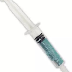 May include: A clear plastic syringe with a white plunger and a needle tip. The syringe contains a teal-colored liquid. The syringe has black measurement markings and a flange for gripping.