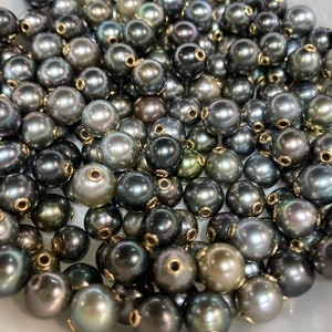 14k GF Tahiti Pearls, grommets set in Tahitian pearls.  100% natural colors Tahitian pearls set with 14k gold filled