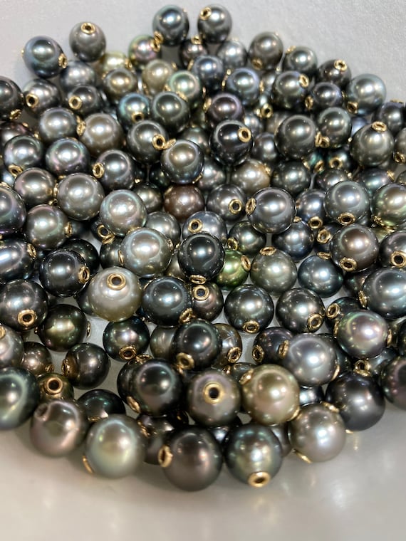 14k GF Tahiti Pearls, grommets set in Tahitian pearls.  100% natural colors Tahitian pearls set with 14k gold filled