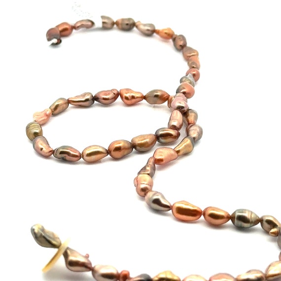 Chocolate brown Tahitian keshi pearl strand, 100% nacre. SKU#CBK2