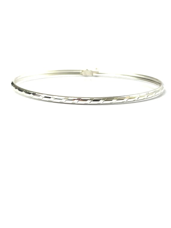 DC striped bangle with clasp