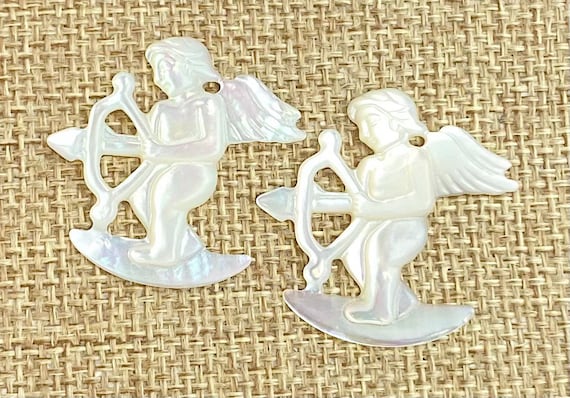 Mother of Pearl Cupid Charm