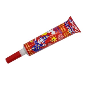 Magic Glue for paper and scrapbooking cards in tube