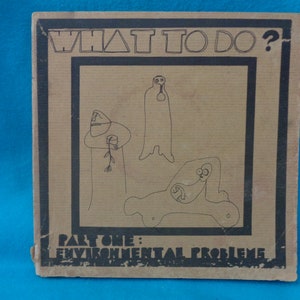 vintage 1970 What To Do! Part 1: Environmental Problems and What To Do! Part 2 Environmental Action - both parts  in one book by Jo Robinson