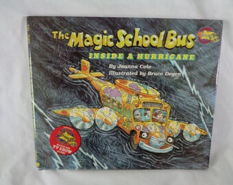 vintage 1995 The Magic School Bus Inside a Hurricane hardcover book with dust jacket by Joanna Cole