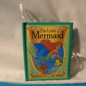 vintage 1993 Walt Disney The Little Mermaid a Walt Disney Gift ornament, carousal, pop up book