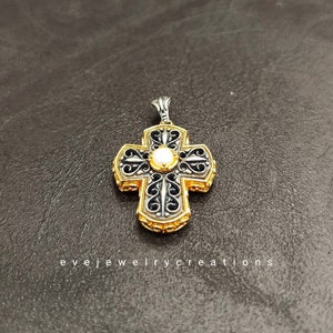Hand made, sterling silver cross pendant.