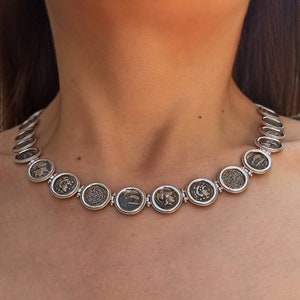 Hand made, sterling silver coin necklace.