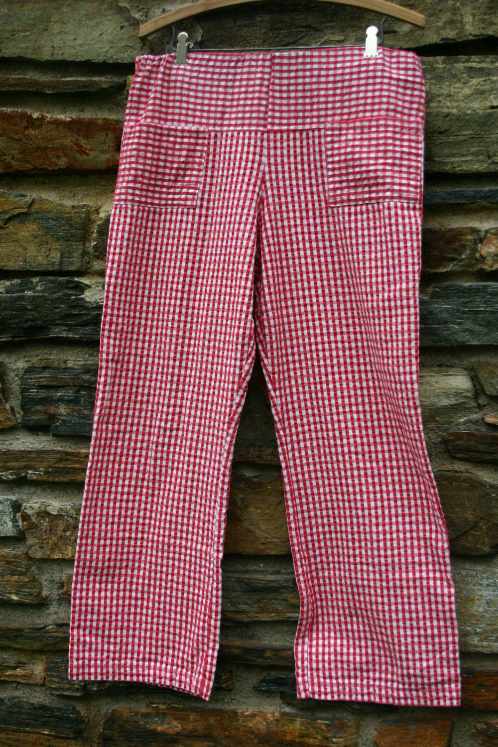 pants with red and white stripe on the side
