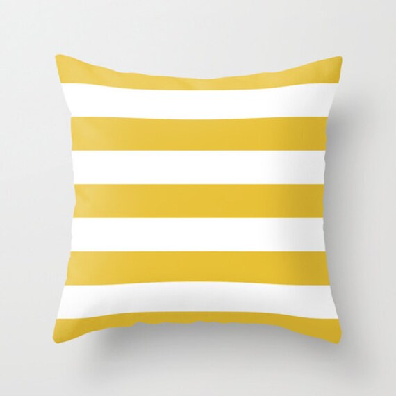 yellow and white striped pillows