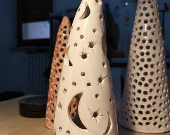 White ceramic tree. Moon and stars