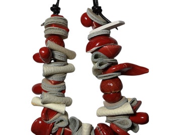 Ceramic necklace and leather. Red and beige