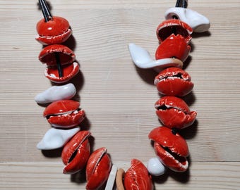 Ceramic necklace. Red and white ears