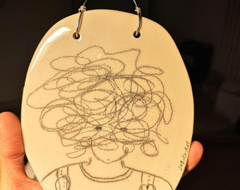 Ceramic plate with illustrations.