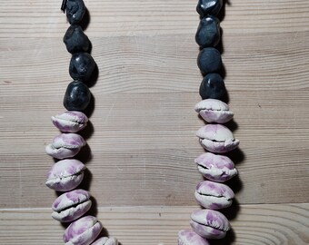 Ceramic necklace. White and lilac ears, metallic stones