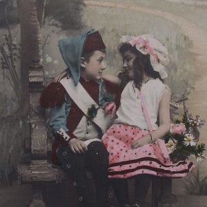 Old postcard of 2 small children "drummer and flower girl", antique postcard, vintage postcard children