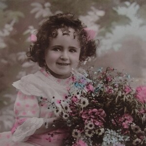 Wonderful glossy vintage postcard of a cute little girl with a bouquet of flowers, old postcard, antique postcard