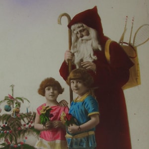Old Christmas postcard, Father christmas with 2 girls