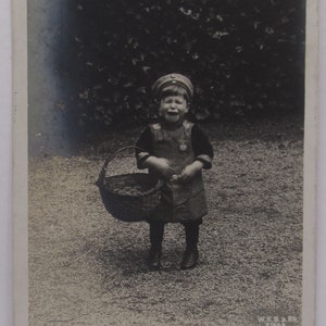 Funny German vintage postcard of a boy with a wicker basket " I lost my bread card! ", old postcards boys, antique postcard children