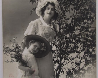 Adorable antique postcard of a mother and child, old postcard, vintage postcard