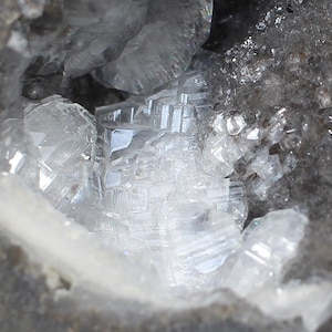 A Diamond-Sawn Coconut Geode Half with Chalcedony Rind and Shiny Tabular Calcite Crystal Interior - Mexico