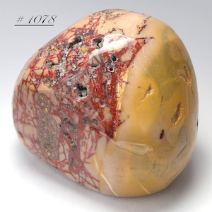 May include: A rustic wooden sign with the text "Welcome to our home" in white lettering. The sign features a distressed finish and a simple, inviting design, perfect for a front porch or entryway.