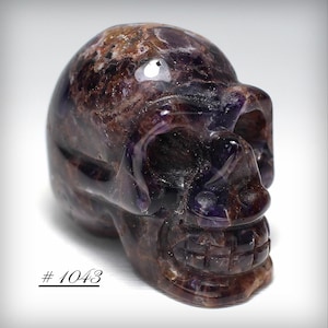 Polished Amethyst Quartz Crystal Skull Sculpture