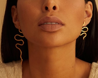 Asymmetrical duo of snake earrings in gold/silver filled for women or men