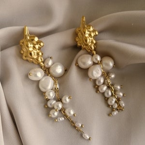 Beautiful dangling earrings with a cascade of pearls and a vintage bunch of grapes, bathed in gold or silver, made by hand in Paris, France