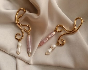 Abstract dangling earrings with natural pearls bathed in gold and made by hand in Paris, France