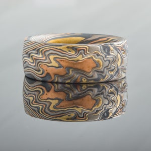 Crafted Mokume Gane Ring or Wedding Band or Ring in Firestorm Palette and Twist Pattern with Kazaru
