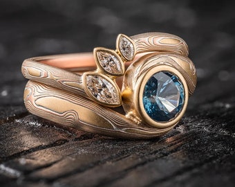 Botanischer Mokume-Gane-Ring mit Holzmaserung, Saphir und Diamanten