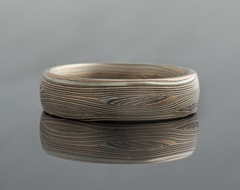 Mokume Gane-ring of trouwring in geoxideerd sintelpalet en vloeipatroon