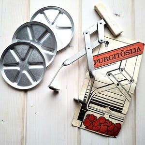 Blikheffer, vintage keukengereedschap uit de Sovjet-Unie uit de jaren 60 van de jaren 60