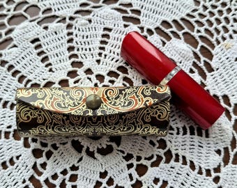 Porta rossetto vintage Fiocchi con manico a guanto, degli anni '60.