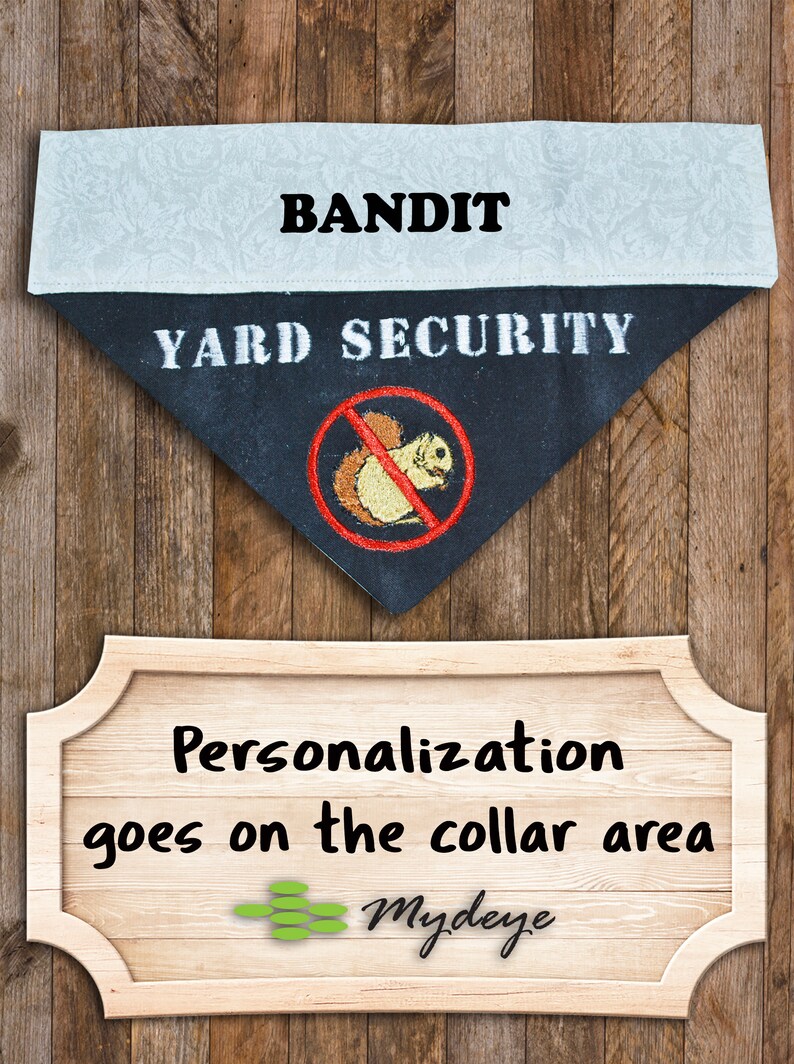 May include: Black and white dog bandana with the text "YARD SECURITY" and a red circle with a squirrel inside with a diagonal line through it. The top of the bandana is white with the text "BANDIT" in black. The bandana is on a wooden background with a sign that says "Personalization goes on the collar area" with a green logo.