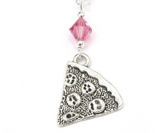 May include: A silver necklace with a pizza slice charm and a pink crystal pendant.