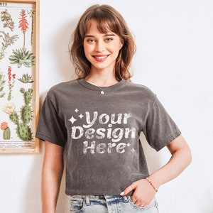 Boho Dark Grey Comfort Colors Pepper Shirt Mockup with Charcoal Model - Studio Mockup